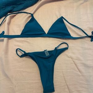 Solid color, never worn bathing suits